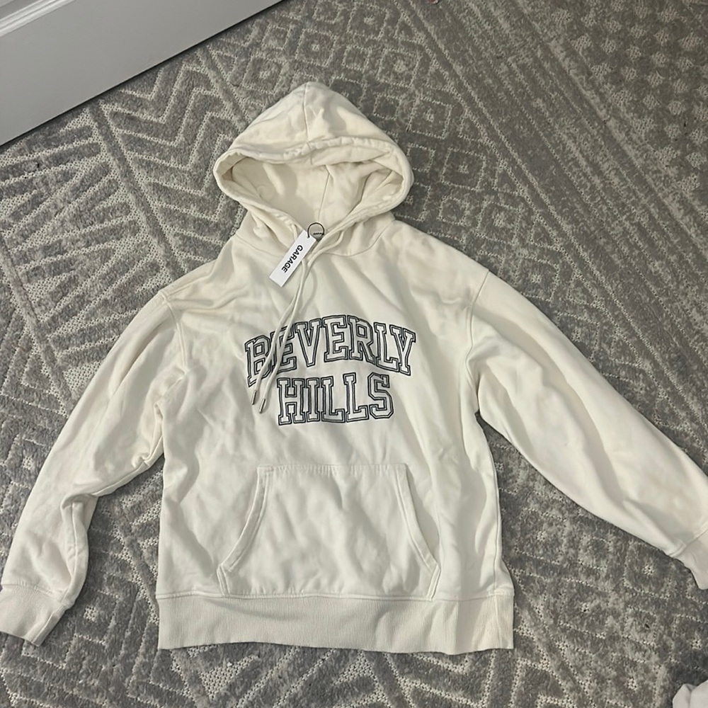 never worn size small beverly hills garage hoodie. super cute. new with tags!